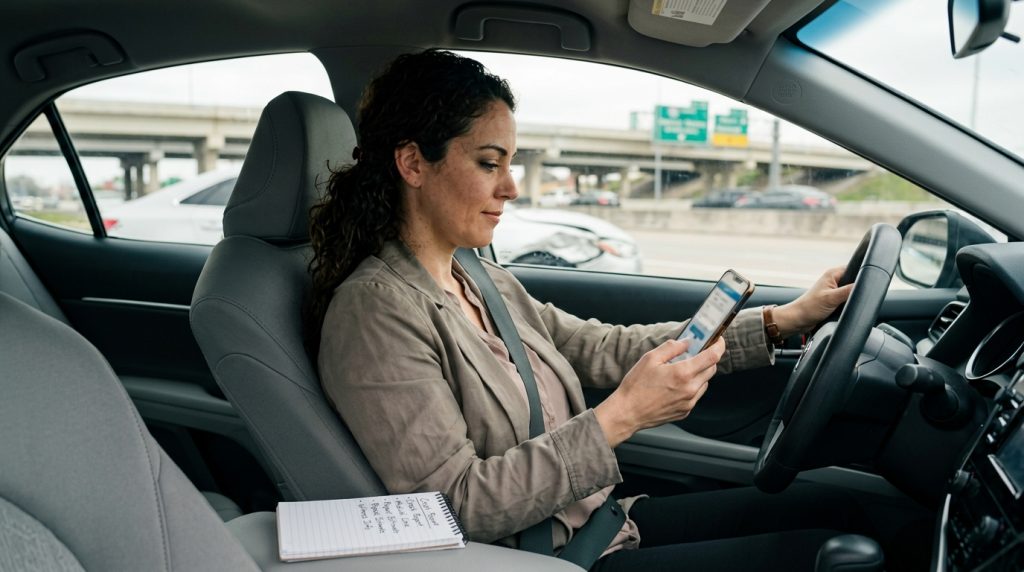 Houston driver reviewing insurance claim steps after a car accident
