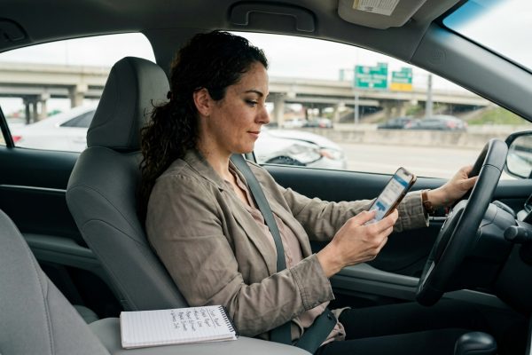 Houston driver reviewing insurance claim steps after a car accident